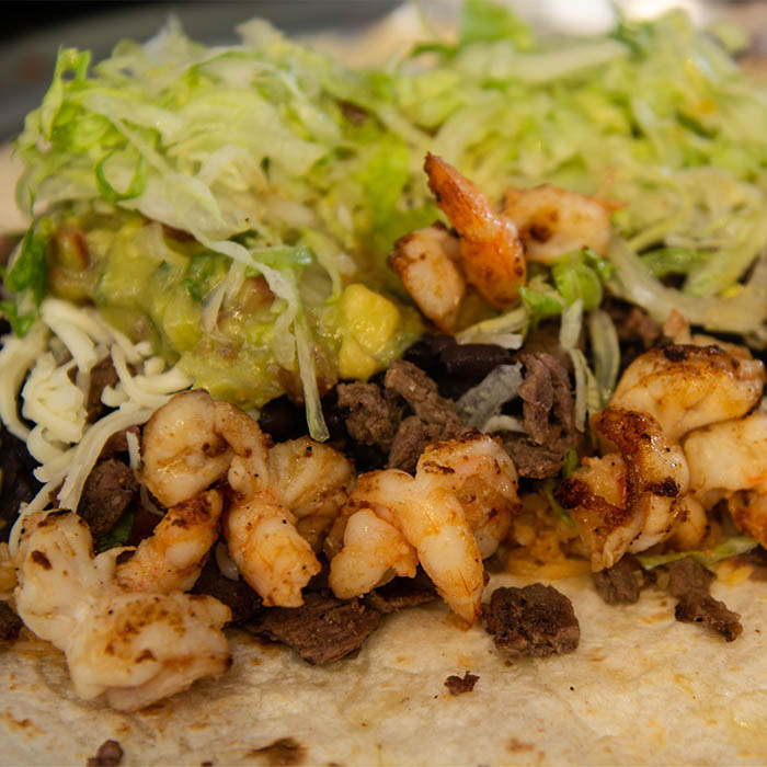 Burrito made with shrimps and meat in San Francisco, California